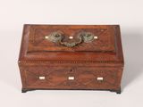 a small wooden box with two handles and two handles on top