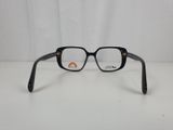 a close up of a pair of glasses on a white surface