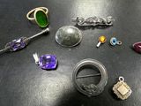 many different types of jewelry on the table