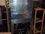 a metal shelf with a metal shelf on top of it