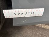 a close up of a sticker on a car ' s bumper