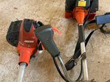 deux outils électriques posés par terre l'un à côté de l'autre