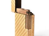 a lighter that is made out of wood and has a lighter inside of it
