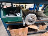 a machine that is sitting on a pallet in a warehouse