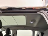 the interior of a car with the sunroof down and the sunroof down