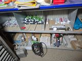 a shelf with many items on it in a room