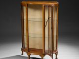 a victorian walnut display cabinet with glass shelves