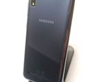 a close up of a cell phone on a stand