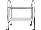 a silver metal trolley with a white seat and wheels