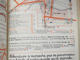 an open book with a map of a city on it
