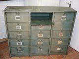 a cabinet with a bunch of drawers in it
