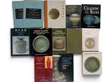 a lot of books that are sitting on a table
