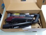 a box with a bunch of vacuums inside of it