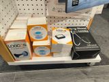 a display of electronics on the shelf in a store