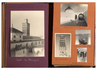 une vieille photo d'un livre contenant des illustrations de bâtiments et d'une tour horloge