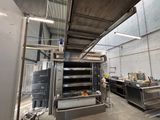 an image of a commercial kitchen with a lot of counter space