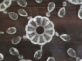 a lot of clear glass pieces on a wooden table