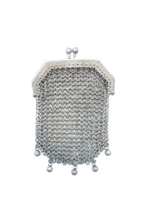 a silver purse with pearls and pearls hanging from it
