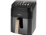a close up of a black air fryer on a white background