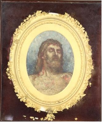 tableau représentant Jésus dans un cadre doré sur fond blanc