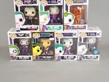 a lot of different batman pop vinyl figures in the box