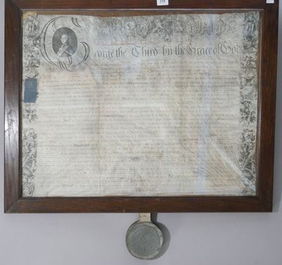 a picture of an old document hanging on a wall
