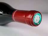 a bottle of wine that is sitting on a table