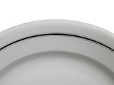 a white plate with a black stripe on it