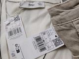 a label on the back of a pair of men ' s pants