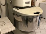 an image of a kitchen with a mixer and a table
