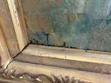 an image of a close up of a painting on a wall