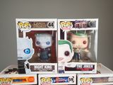 three pop vinyl figures of the night king and the joker are on display