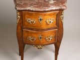 an image of a marble topped chest of drawers on a white background