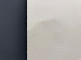 a piece of paper that has been cut in half
