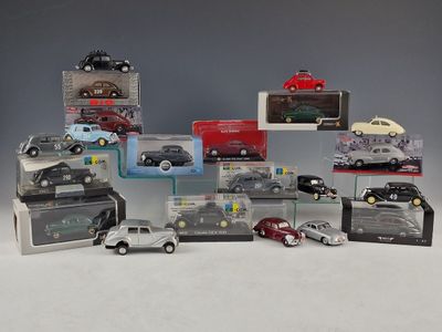 a lot of toy cars that are in a display case