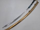 two swords, one with a gold handle and the other with a blue handle