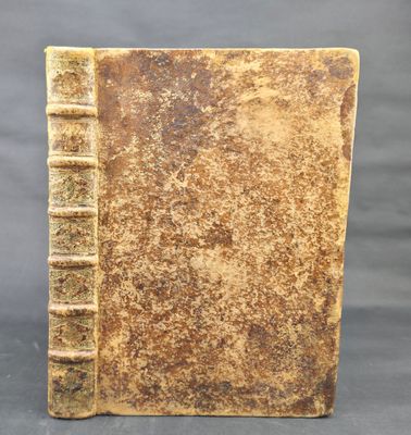 an old book sitting on top of a table