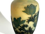 a vase that has a picture of a flower on it