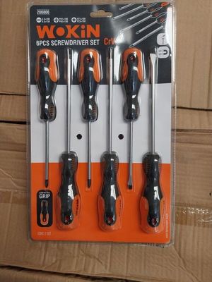 four pieces of screwdriver set in a package on top of a cardboard box