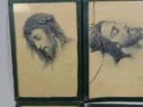 two framed pictures of jesus and a woman with a cross