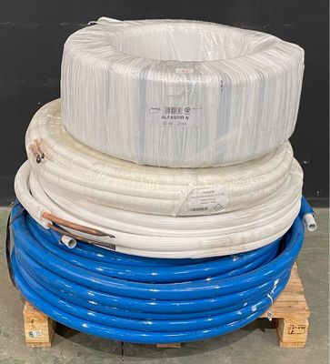 a stack of blue and white hoses sitting on a pallet