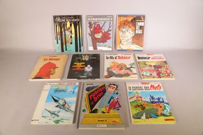 a lot of books that are on the table