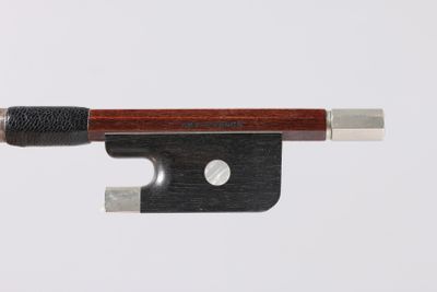 the bow is made of wood and has a metal tip