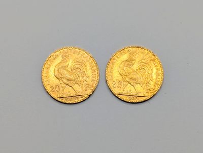 deux souverains d'or, l'un orné d'une tête de lion et l'autre d'une tête de lion