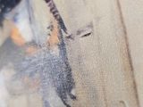 a close up of a painting of a bird on a canvas