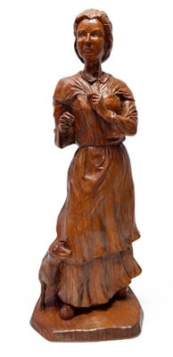 "La bergère" Sculpture en résine à l'imitation du bois.