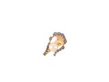 a close up of a single pearl and diamond ring