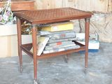 a small table with a bunch of books on it