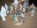 many figurines that are sitting on a table