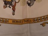 a picture of a scarf with a picture of a man riding a horse